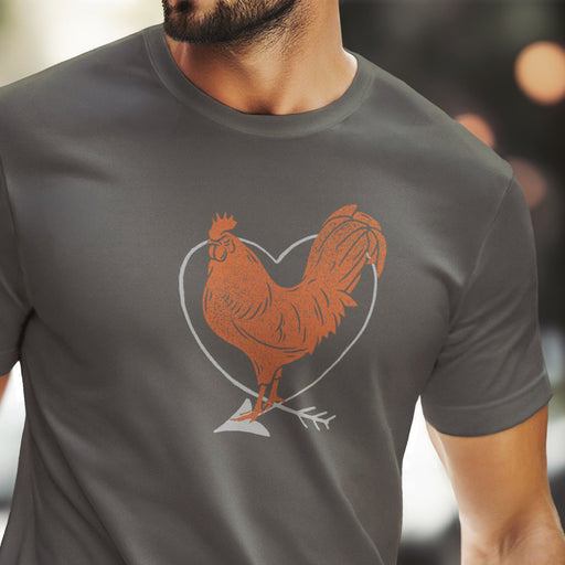 PRODUCT IMAGE: I Love Cock | SFW Raunchy T-shirt for Horny Gay Guys who Love Cock | Model wears Asphalt gray shirt with rooster and heart graphic 