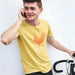 PRODUCT IMAGE | I Love Cock T-shirt from Aloe & Hole | The rooster symbolizes penis | Model w/ Yellow Shirt