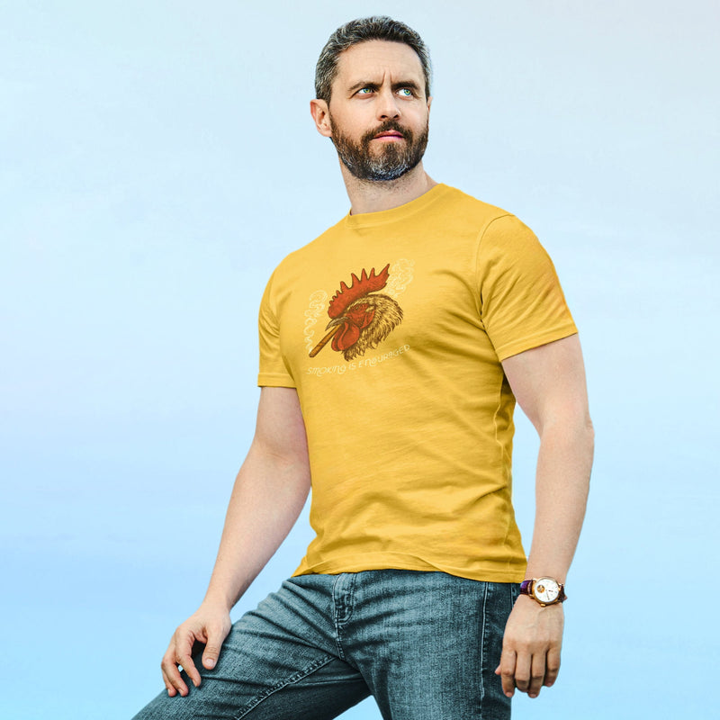 PRODUCT IMAGE: Smokin’ Cock Tee  | Funny, Raunchy T-shirt for Horny Gay Men | Model wears Daisy shirt with a vintage-style graphic of a rooster smoking a cigar