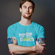 PRODUCT IMAGE: Balls Deep | Raunchy Tee for Horny Gay Guys who Like it Deeper | Model wears Typographic design on Turquoise shirt