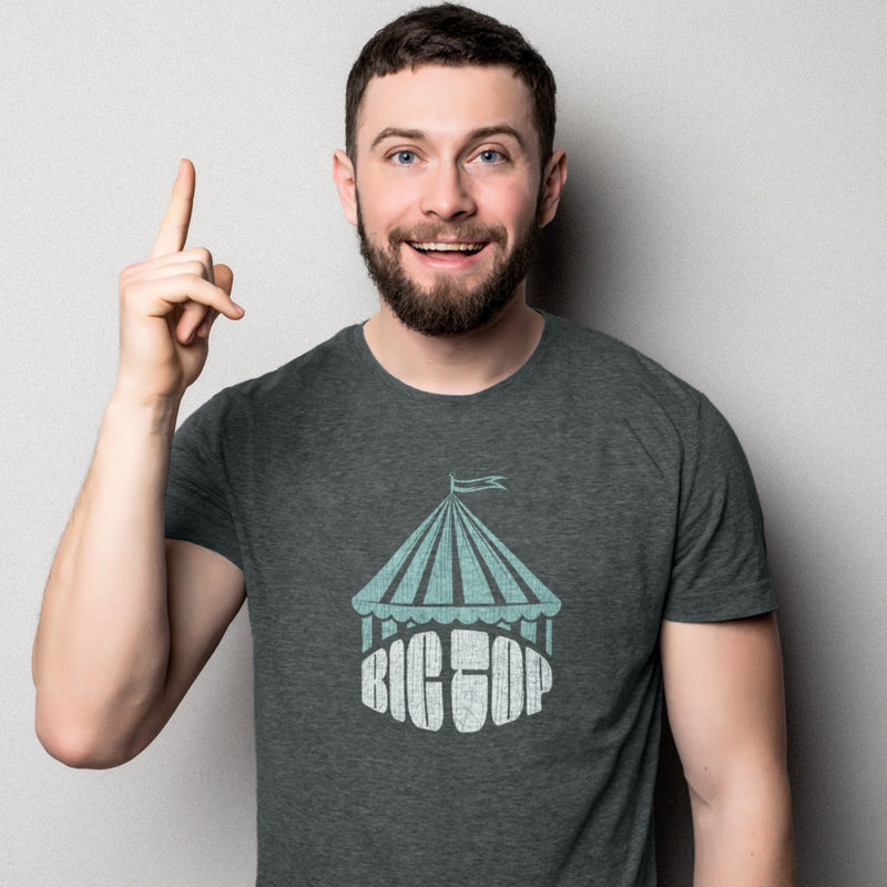 PRODUCT IMAGE: Big Top T-shirt | Raunchy Tees for Gay Alpha Males, Queer Top Guys | Model wears Dark Gray Heather shirt, the graphic formed with bold typography covered with an abstractly shaped circus "big top" 
