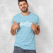 PRODUCT IMAGE: Breed T-shirt | Raunchy Tees for Horny Gay Guys Who Bareback, Love Cum | Model wears typographic design on Ocean shirt