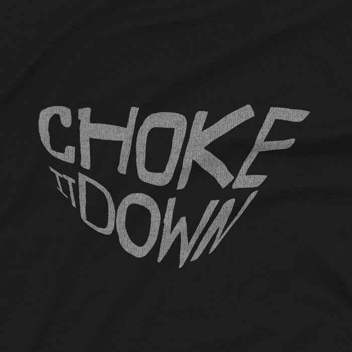 PRODUCT IMAGE: Choke It Down | Raunchy T-shirts for Horny Gay Guys who appreciate oral play with varying degrees of restrained forcefulness | Close-up of Black shirt with a gritty, textured typographic design