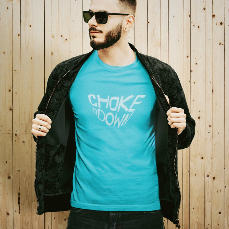PRODUCT IMAGE: Choke It Down | Raunchy T-shirts for Horny Gay Guys who appreciate oral play with varying degrees of restrained forcefulness | Model wears Tropical Blue shirt with a gritty, textured typographic design