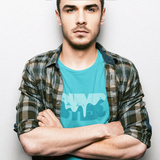 PRODUCT IMAGE: Dumpster T-shirt | Raunchy Tees for Horny Gay Guys Who Take Loads | Model wears Turquoise shirt with a typographic design featuring white dripping liquid referring to a man's cum