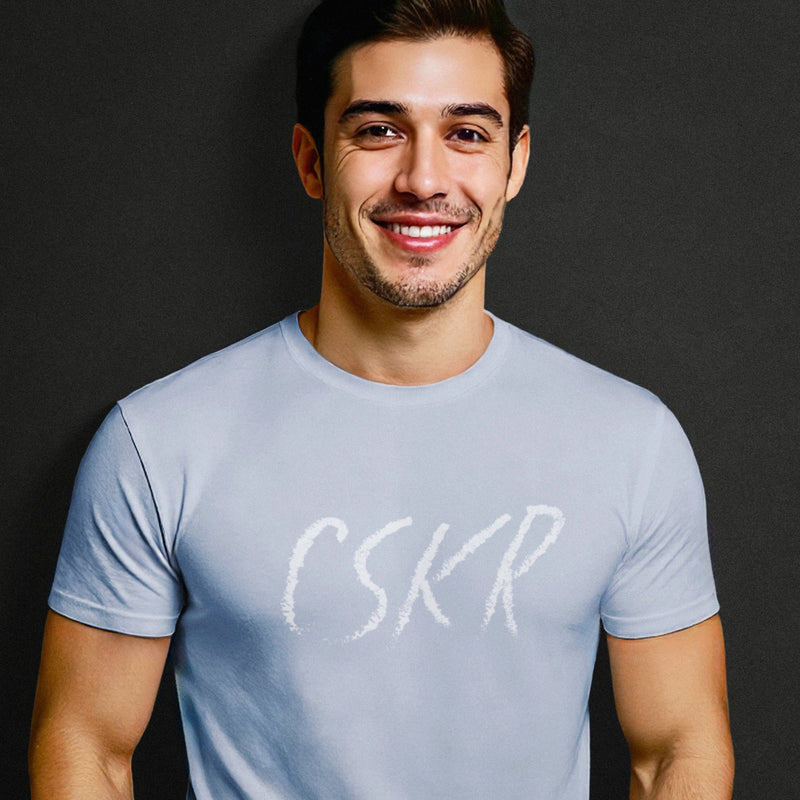 PRODUCT IMAGE | CSKR T-shirt from Pole & Hole | The texting (or sexting) abbreviation for cocksucker | Model w/ Light Blue Shirt