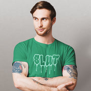 PRODUCT IMAGE: Cum Slut | Raunchy Tees for Horny Gay Men Who Love Cum | Model wears Kelly Green shirt