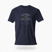 A navy blue short-sleeve t-shirt with a vintage-style graphic on the chest reading 'DADDY SERVICES CO' in white and gold, featuring a gold mustache illustration, shown against a plain white background.