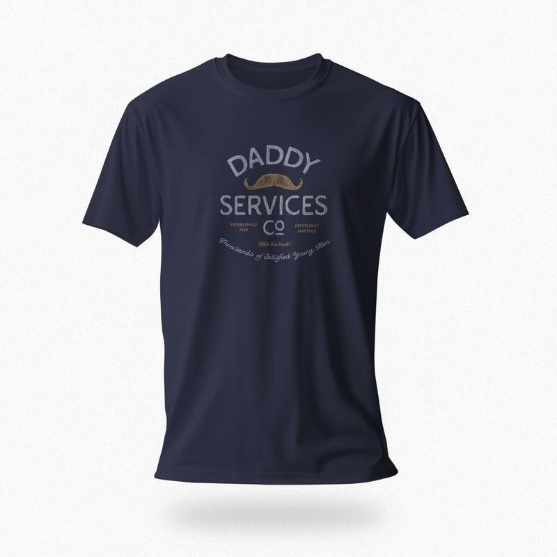 A navy blue short-sleeve t-shirt with a vintage-style graphic on the chest reading 'DADDY SERVICES CO' in white and gold, featuring a gold mustache illustration, shown against a plain white background.