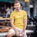 Deeper T-shirt | Raunchy Tees for Horny Gay Guys Who Like to Bang | Model wears Yellow shirt with a typographic design