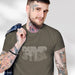 PRODUCT IMAGE: Dumpster T-shirt | Raunchy Tees for Horny Gay Guys Who Take Loads | Model wears Army colored shirt with a typographic design featuring white dripping liquid referring to a man's cum