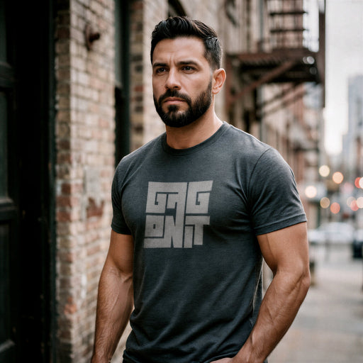 PRODUCT IMAGE: Gag on It T-shirt | Raunchy Tees for Horny Gay Oral Top Guys | Model wears Dark Gray Heather shirt with a typographic design