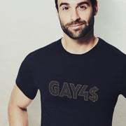 Model wears black GAY4$ shirt with bold, bling-inspired typography — a cheeky, provocative tee for queer men and hustlers alike.