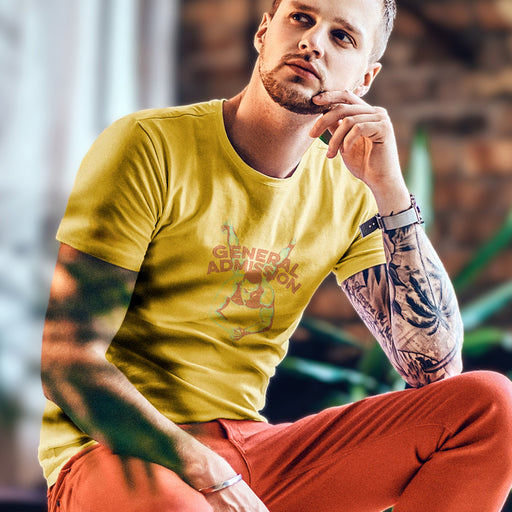 Model wears light yelllow "General Admission" t-shirt | Homo erotic graphic of nude male laying on his stomach, looking up at camera; his back is covered by the letter forms that spell the name of the shirt design | Raunchy Gay Tee for Submissive Males