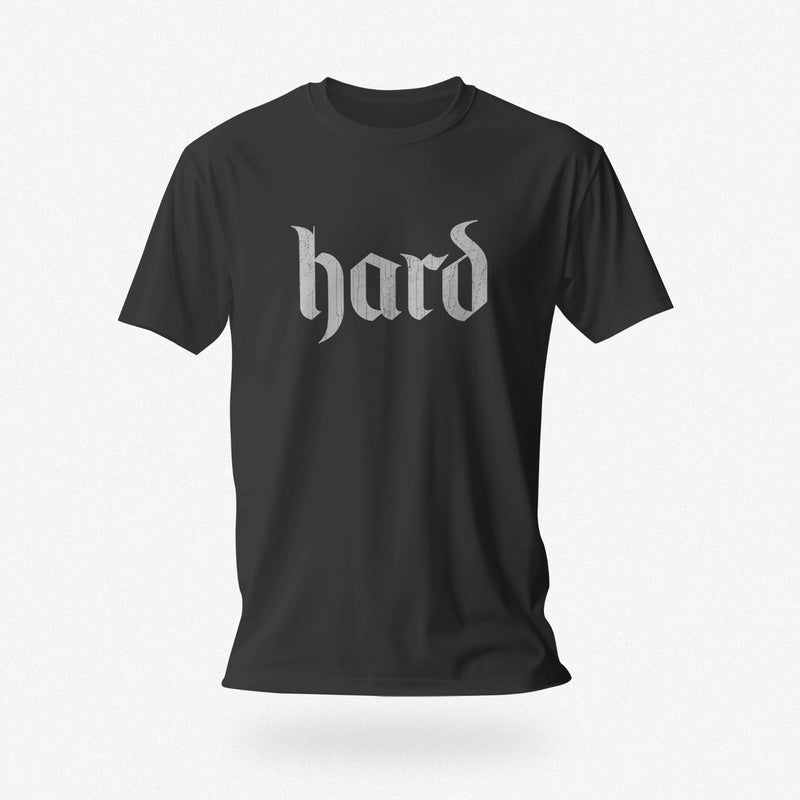 PRODUCT IMAGE: Hard T-Shirt | Raunchy Graphic Tee for Horny Gay Men into big boners, hard cocks, and erections | Dark Gray shirt with a design created with blackletter / gothic typography