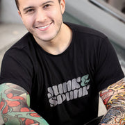 PRODUCT IMAGE: Junk & Spunk T-shirt | Raunchy Tees for Horny Gay Guys | Model wears Black (2) shirt