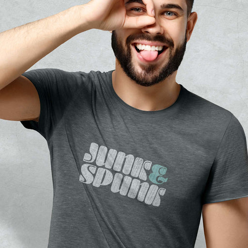 PRODUCT IMAGE: Junk & Spunk T-shirt | Raunchy Tees for Horny Gay Guys who like cock and cum | Model wears Dark Gray Heather shirt