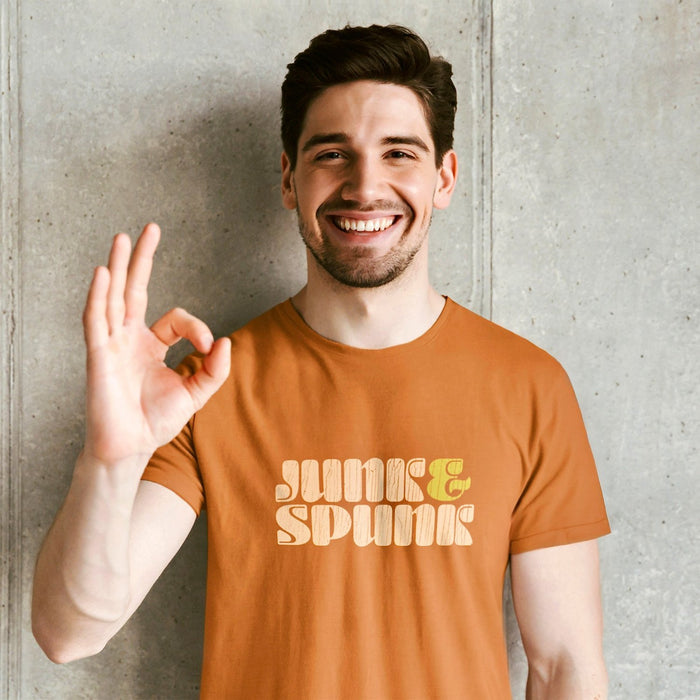 PRODUCT IMAGE: Junk & Spunk T-shirt | Raunchy Tees for Horny Gay Guys | Model wears Orange shirt w/ typographic design