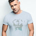 PRODUCT IMAGE: Kick Back Blowjob | NSFW Homo Erotic T-shirt | Model w/ Light Blue Shirt