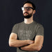 PRODUCT IMAGE: He Likes It Nice & Slow T-shirt | Funny Gay Tee for the guys who take their time and enjoy the ride | Model wears Charcoal shirt with a design borne out of retro-inspired typography
