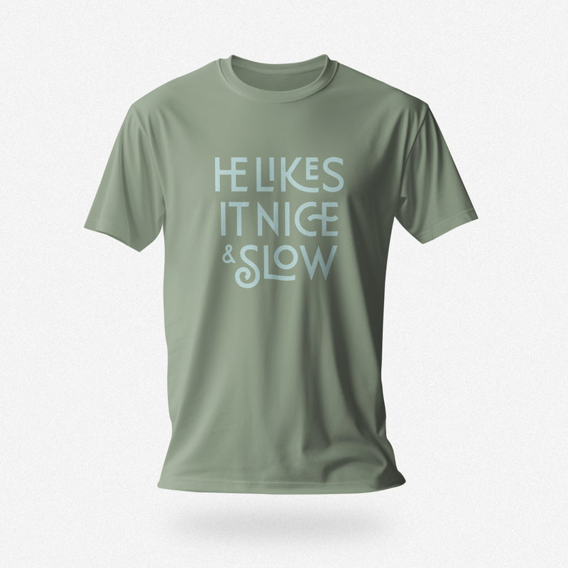 PRODUCT IMAGE: He Likes It Nice & Slow T-shirt | Funny Gay Tee for the guys who take their time and enjoy the ride | Sage shirt with a design borne out of retro-inspired typography