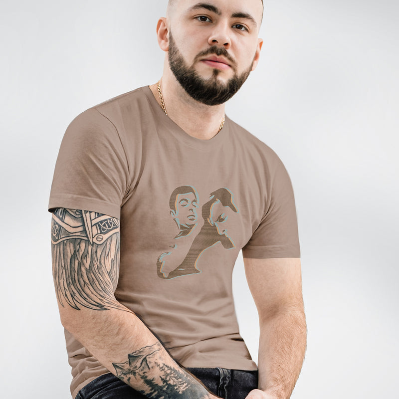 Male model wears a Pebble "Nosh" T-shirt featuring an abstract homoerotic graphic illustration of a blowjob