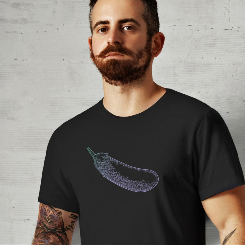 PRODUCT IMAGE: Certified Organic T-shirt | Raunchy Penis T-shirts for Horny Gay Men | Model wears Black shirt with a woodcut-style rendering of the eggplant emoji