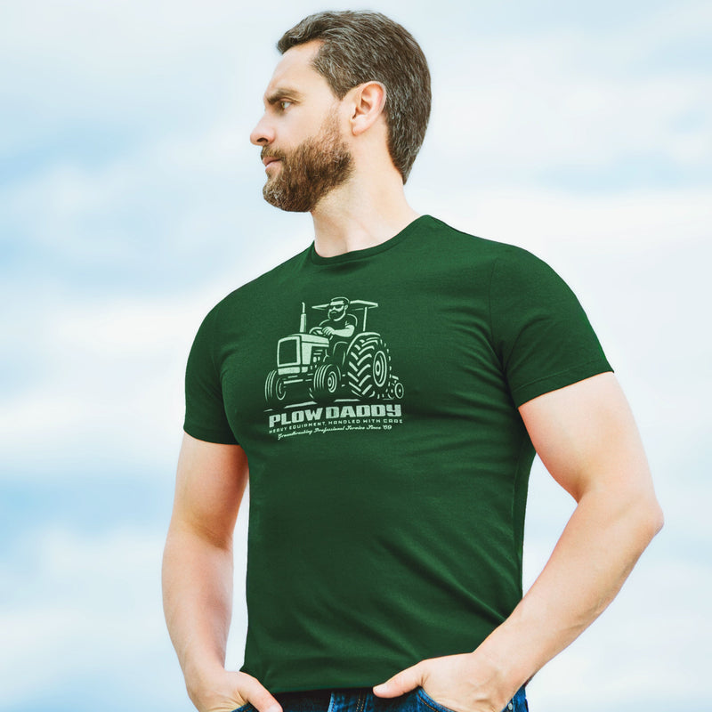 PRODUCT IMAGE: Plow Daddy T-shirt | Raunchy Gay Farmer Tee for Horny Men Who Love Heavy Equipment | Model wears Forest Green shirt