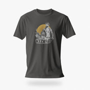 PRODUCT IMAGE of an Asphalt t-shirt with a graphic featuring a rugged, bearded biker in a distressed vintage print style with the design's namesake, "Ride It."