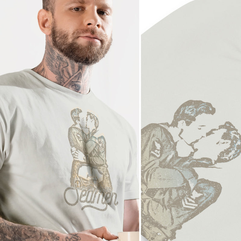 DIPTYCH PRODUCT IMAGE: Seamen | Seamen T-shirt | Raunchy T-shirts Play on Word "Semen" | On left, model wears silver shirt; on the right, a close-up of just the shirt and printed graphic | Modeled from a vintage photo of two gay male sailors kissing. Seamen is a homonym, playing on the word — yep, you guessed it — semen. 