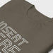 PRODUCT IMAGE: Insert Here | Raunchy T-shirts for Horny Gay Bottom Guys | Close up detail of typographic design on Army brown shirt