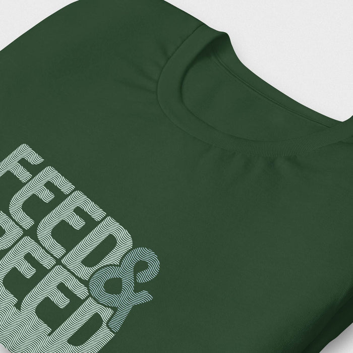 PRODUCT IMAGE: Feed & Breed T-shirt | Raunchy Tees for Horny Gay Guys | Detail photo of Forest green shirt with typographic design