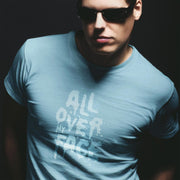 All Over My Face | Raunchy Tees for Horny Gay Guys who Love Cum | Model wears Ocean shirt w/ typographic design