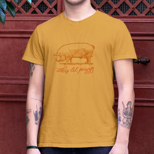PRODUCT IMAGE: This ‘Lil Piggy T-shirt | Funny Gay SFW Tee for Horny Gay Guys | Model wears Mustard shirt