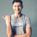 PRODUCT IMAGE: Deeper | Raunchy T-shirt for Horny Gay Men | Model wears Light Gray Heather shirt