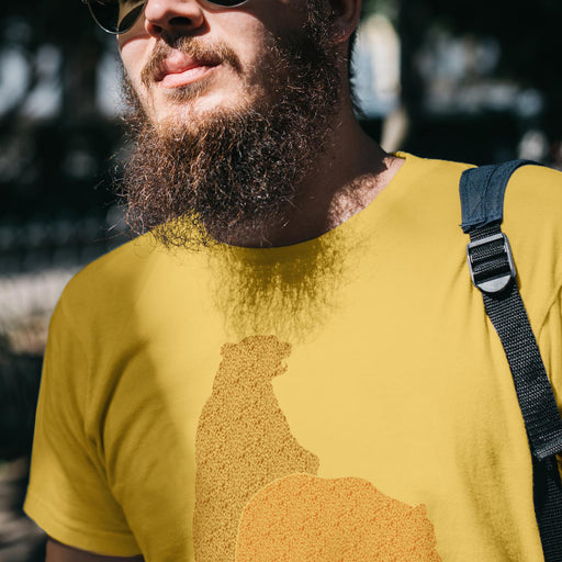 PRODUCT IMAGE: Bear Back | Raunchy T-shirt for Gay Bears, Cubs, Otters who Bareback | Model wears graphic of pattern-shaped bears humping on Yellow shirt