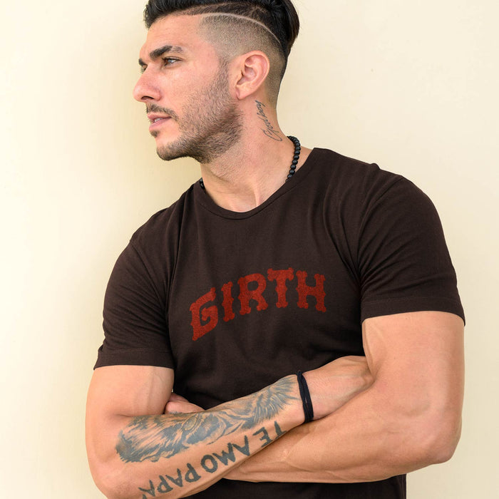 PRODUCT IMAGE: Girth Tee | Homo Erotic T-shirts for Gay Guys | Thick Cocks & Bears | Model wears Brown shirt with typographic design