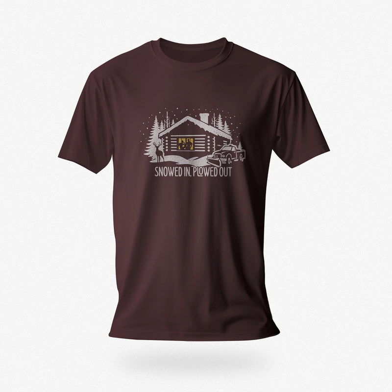Men’s graphic t-shirt showing a snowy log cabin and plow truck, featuring the phrase “Snowed In, Plowed Out,” a subtle innuendo design for gay men; product photo of oxblood tee.