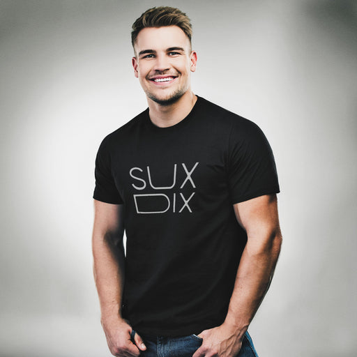 PRODUCT IMAGE: Sux Dix T-shirt | Raunchy Tees for Horny Gay Men Who Like Oral Sex | Model wears Typographic design on Black Shirt